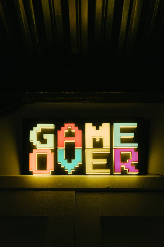 Bright neon Game Over sign in retro style, perfect for gaming nostalgia